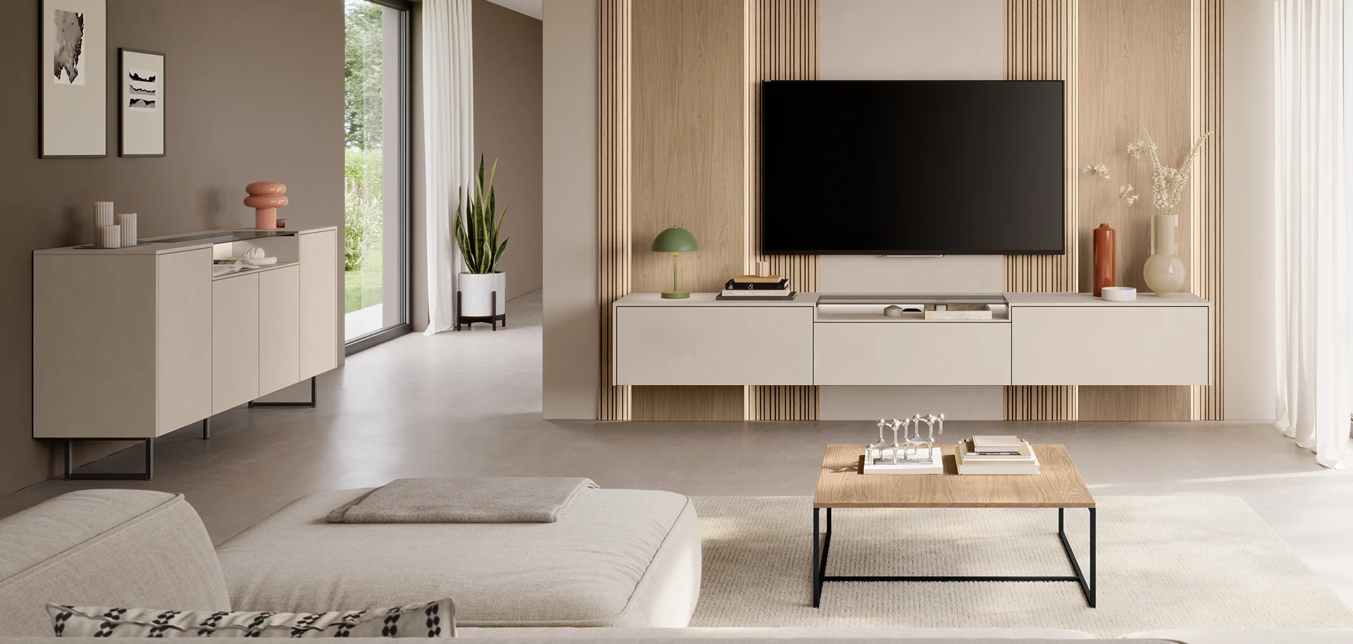 Sala de estar contemporánea con muebles elegantes, plantas verdes y luz natural, que emana una atmósfera tranquila y moderna.