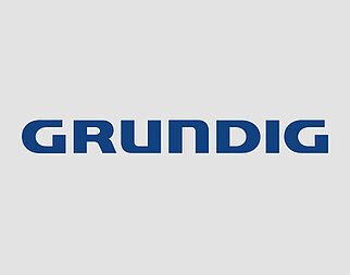 Obrazek przedstawia słowo "GRUNDIG" napisane pogrubionymi wielkimi literami, wyśrodkowane na czystym białym tle, sugerując firmowe logo.