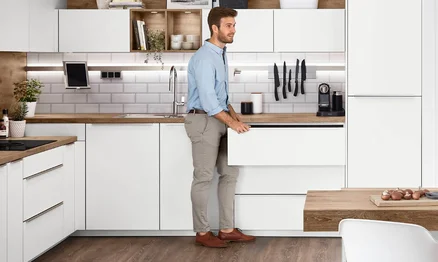 Přizpůsobená pracovní výška v ergonomické kuchyni