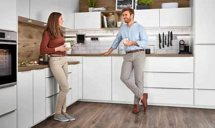 Keuken met aangepaste werkhoogte voor optimale ergonomie - verschillende werkhoogtes voor iedereen.