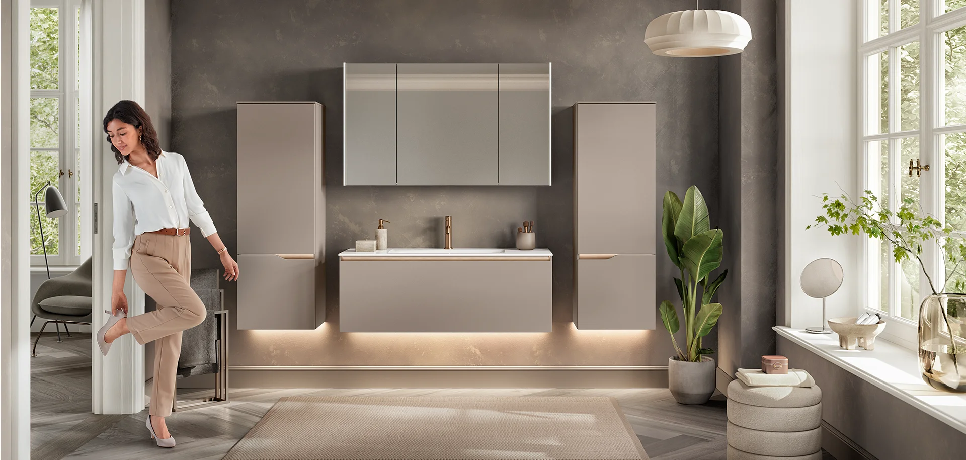 Modern bathroom furniture design with light accents and plenty of storage space.