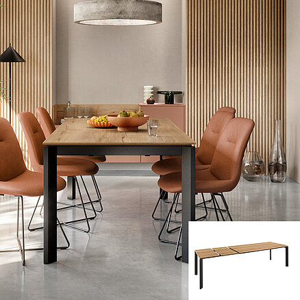Moderní jídelna s rustikálním dřevěným stolem s kovovými nohami, doplněný stylovými terakotovými židlemi v minimalistickém, teple osvětleném interiéru.