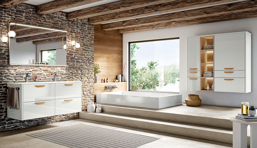 Geräumiges modernes Badezimmer mit einer eleganten Badewanne, Doppelwaschtisch, Steinwänden, Holzbalken und einem malerischen Blick aus dem großen Fenster.